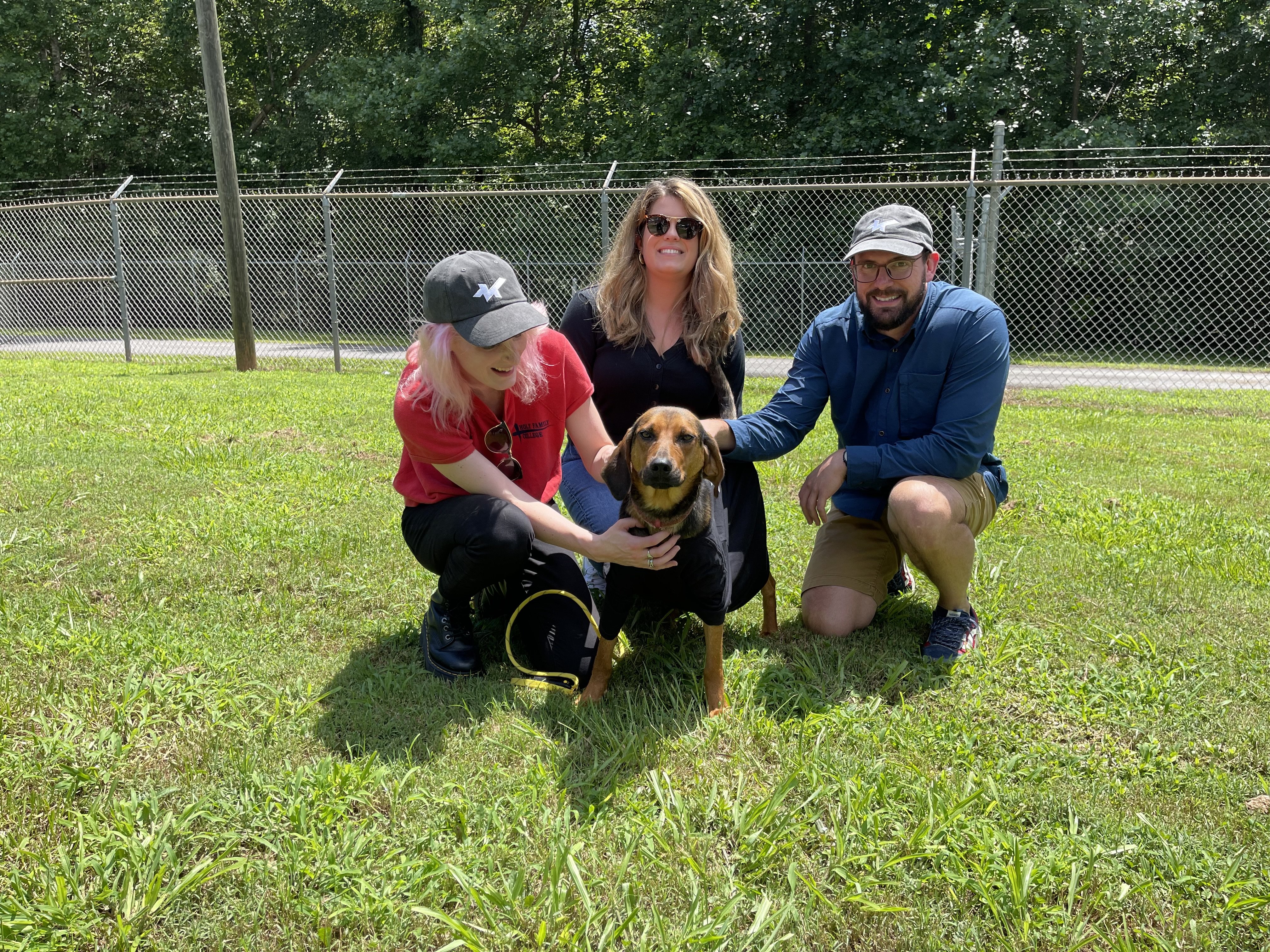 VanNoppen Marketing team with shelter dog Hailey Adopt a Dog