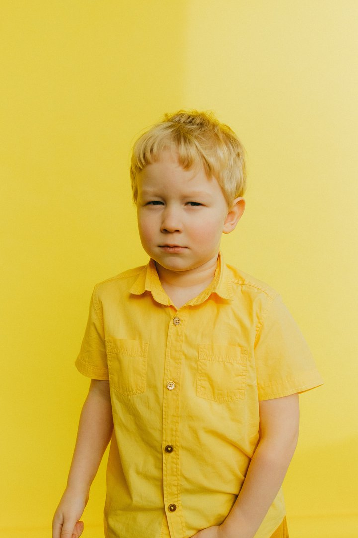 Suspicious Boy in Yellow